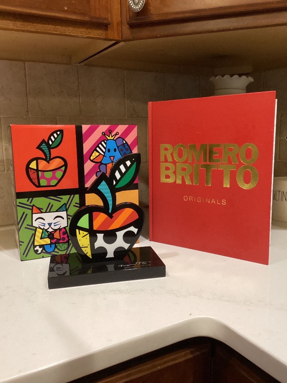 Signed Romero Britto Apple sculpture and coffee table book